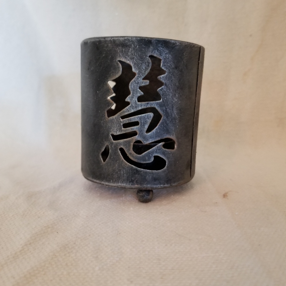 Cutout design candle holder for votives tealights